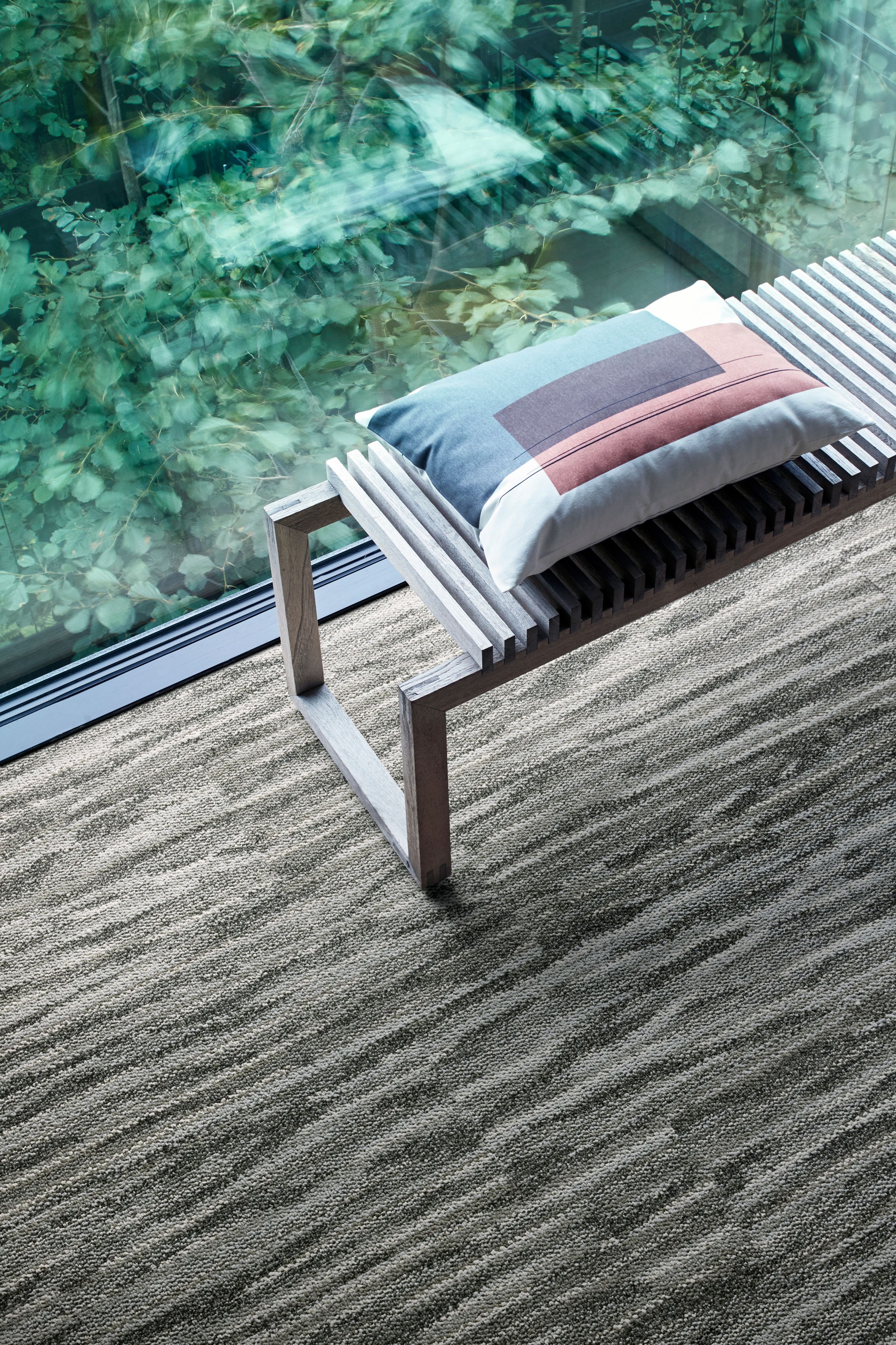 Interface Another Angle plank carpet tile in seating area with wood bench image number 5